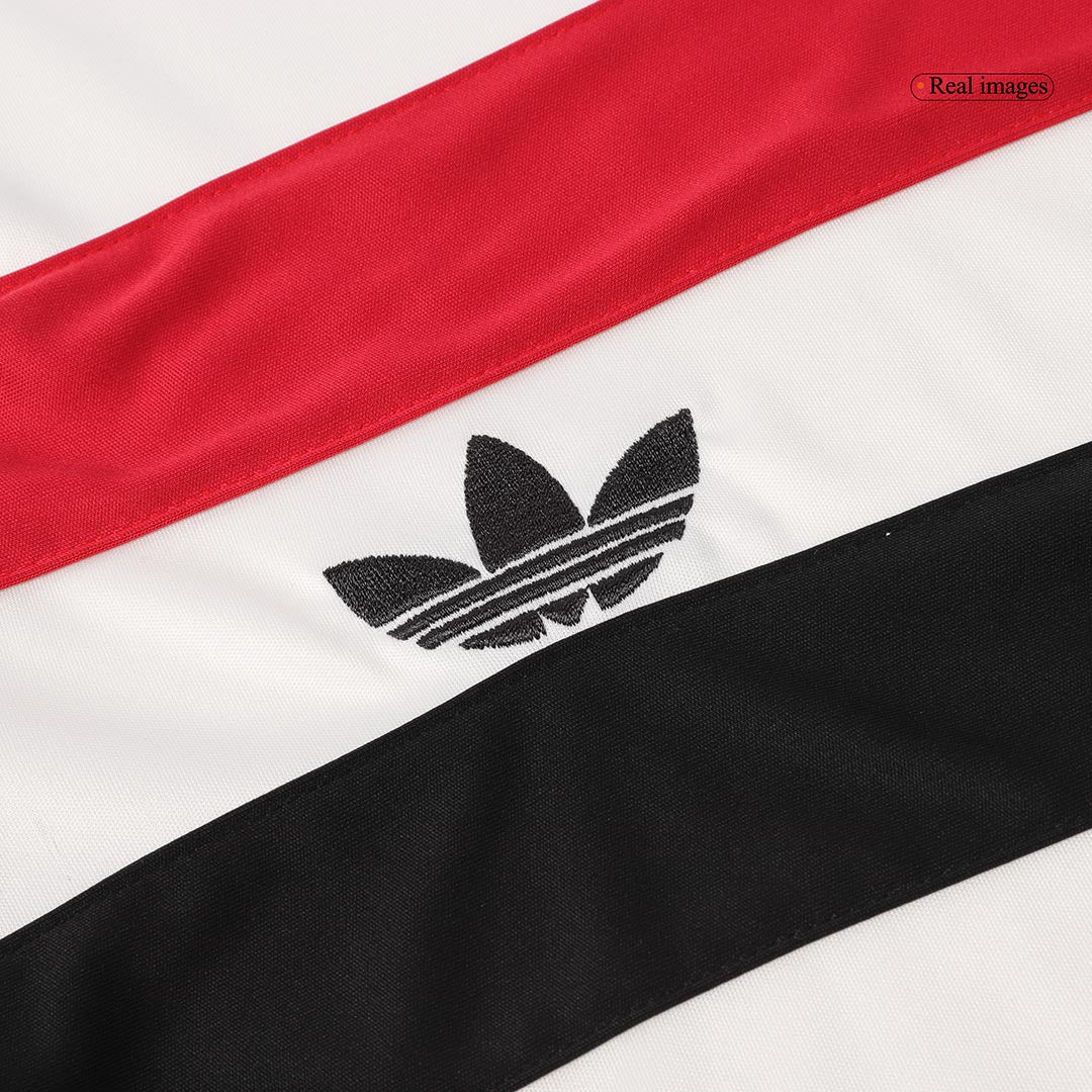 Manchester United Auswärts-Fußballtrikot 2024/25 (Trikot + Shorts + Socken)